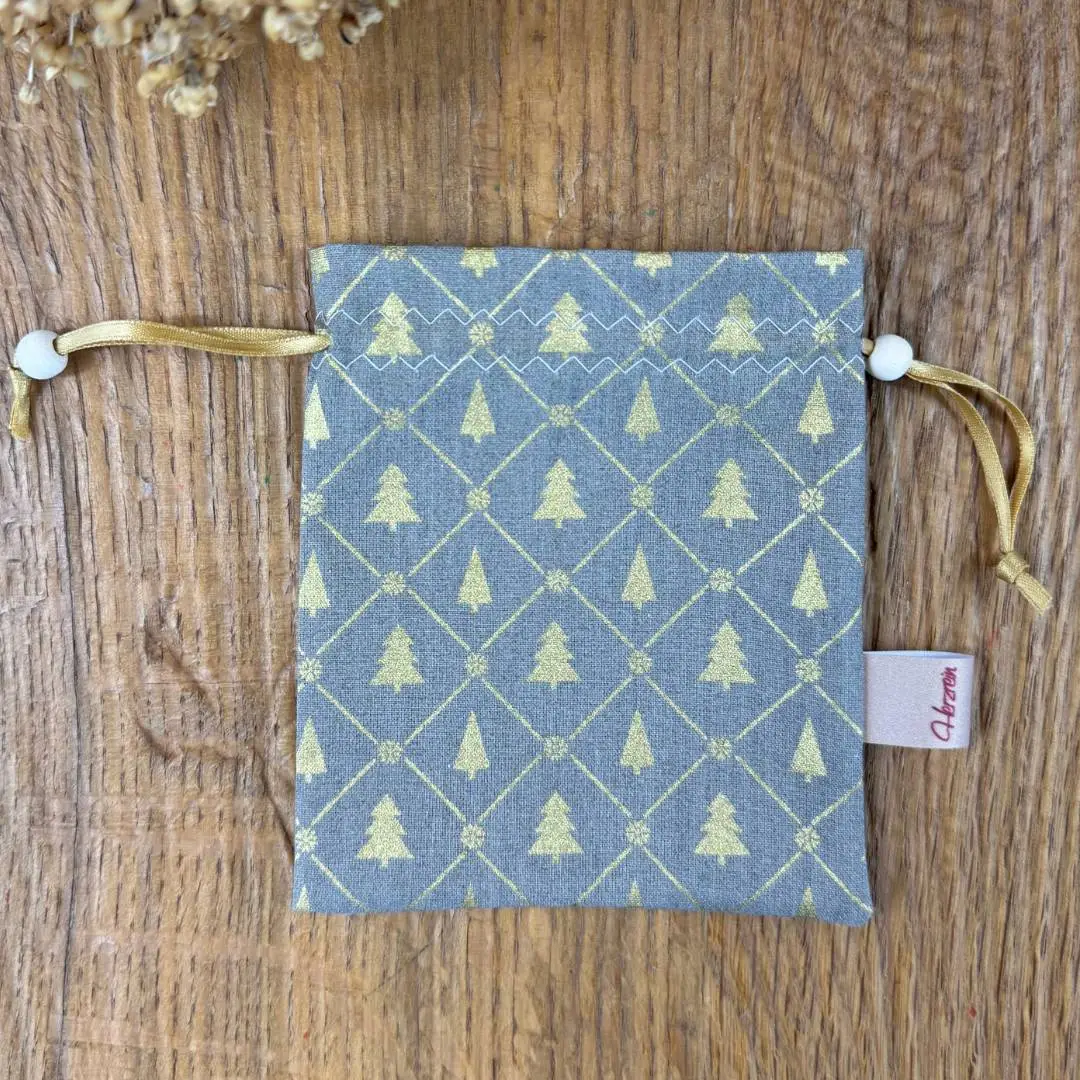 Handgenähtes Schutzsäckchen im Herzrein-Design für Sonnenstein Heilsteine